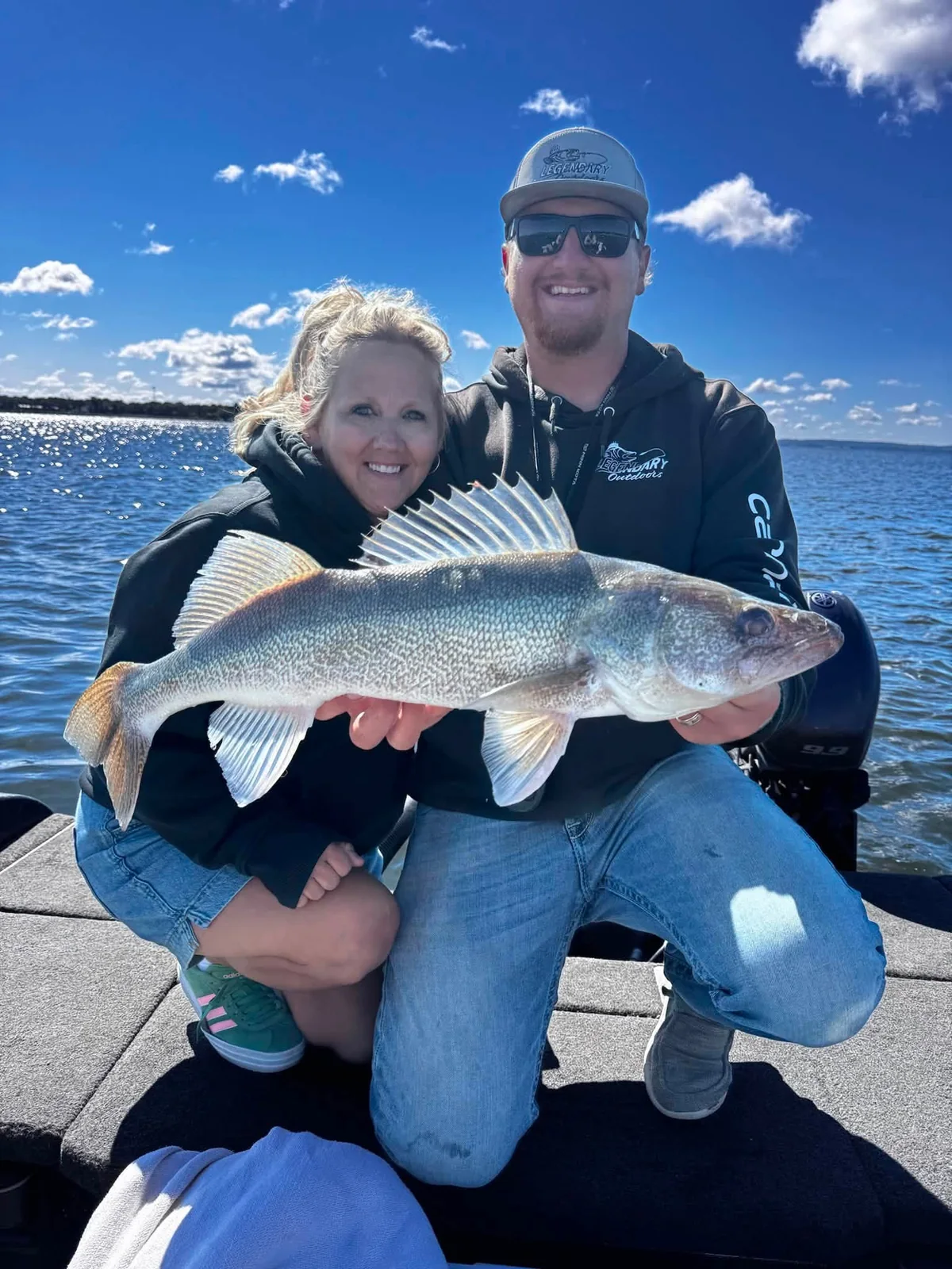 Legendary Outdoors guide and guest with a trophy walleye